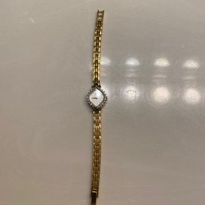 Pulsar Women’s watch with diamonds and green gemstones